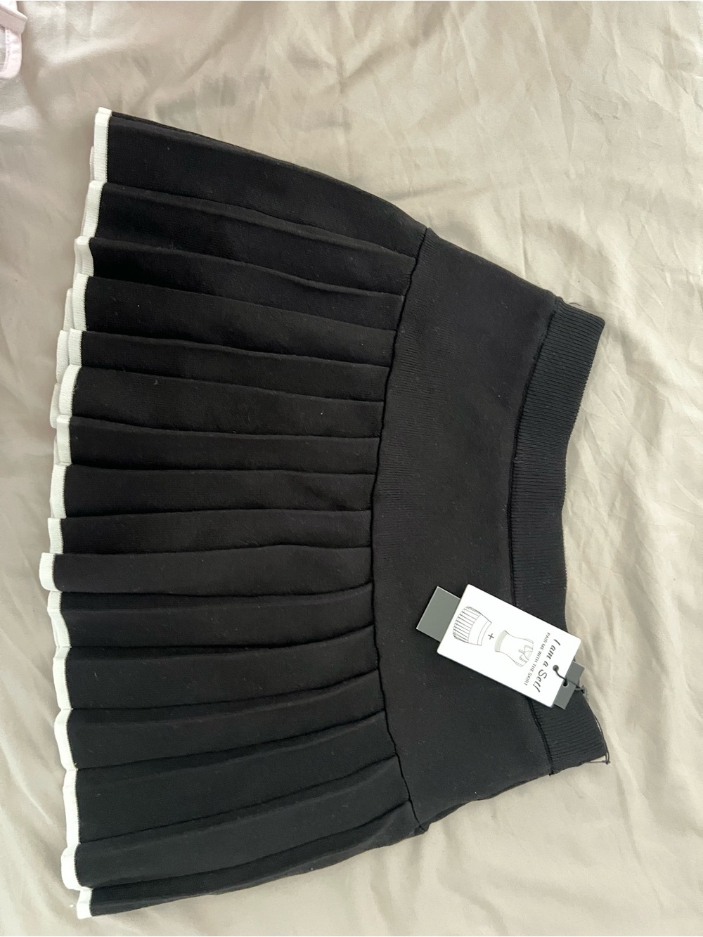 Black Pleated Mini Skirt with White Hem